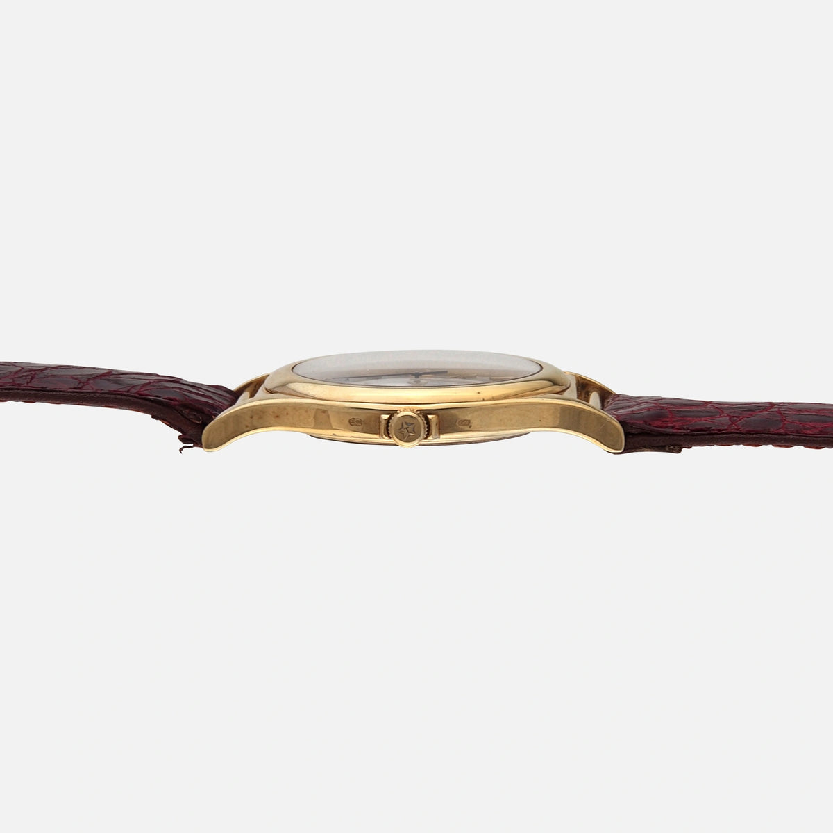 theorein-t90634k-18k-gold-case-crown-side-vintage-dress-watch