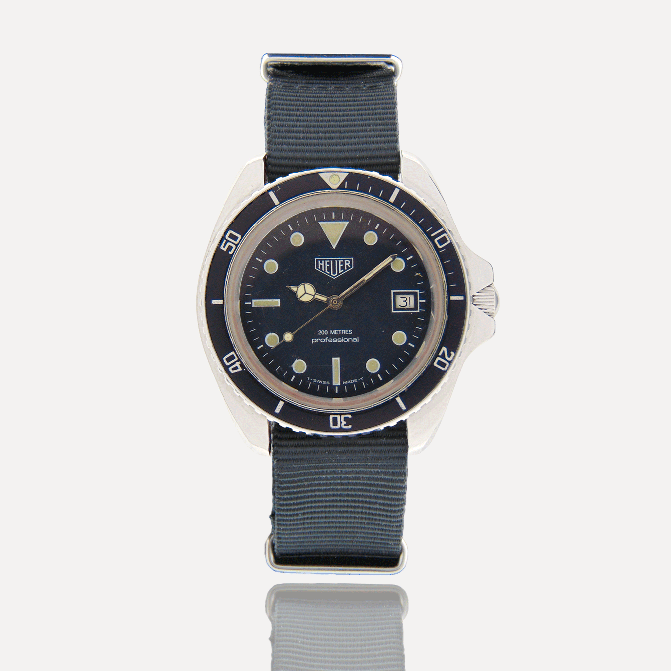 1980s Vintage Heuer Professional 200 Watch Model ref. 844 2 Monnin in Steel for sale on Vintage Watch Leader