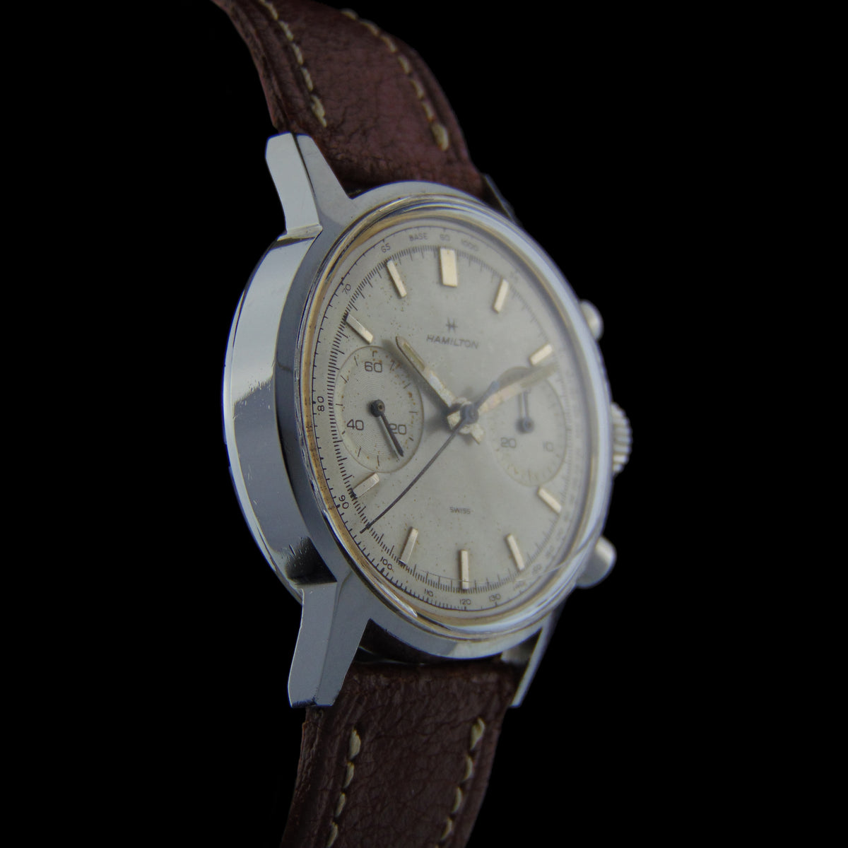 1960s Hamilton Chronograph Ref 7723 - Manifacturer - Hamilton Years - 1960s  Movement – Valjoux 7730, Manual winding Model Name – N/A Reference – 7723 Material - Stainless steel case Bracelet/Strap - Generic leather band Clasp/Buckle - Generic steel buckle Dimensions - 36mm x 42,5mm Signed - Dial, Movement, Caseback and Crown1960s Hamilton Chronograph Ref. 7723 vintage valjoux 7730 for sale vintage watch leader
